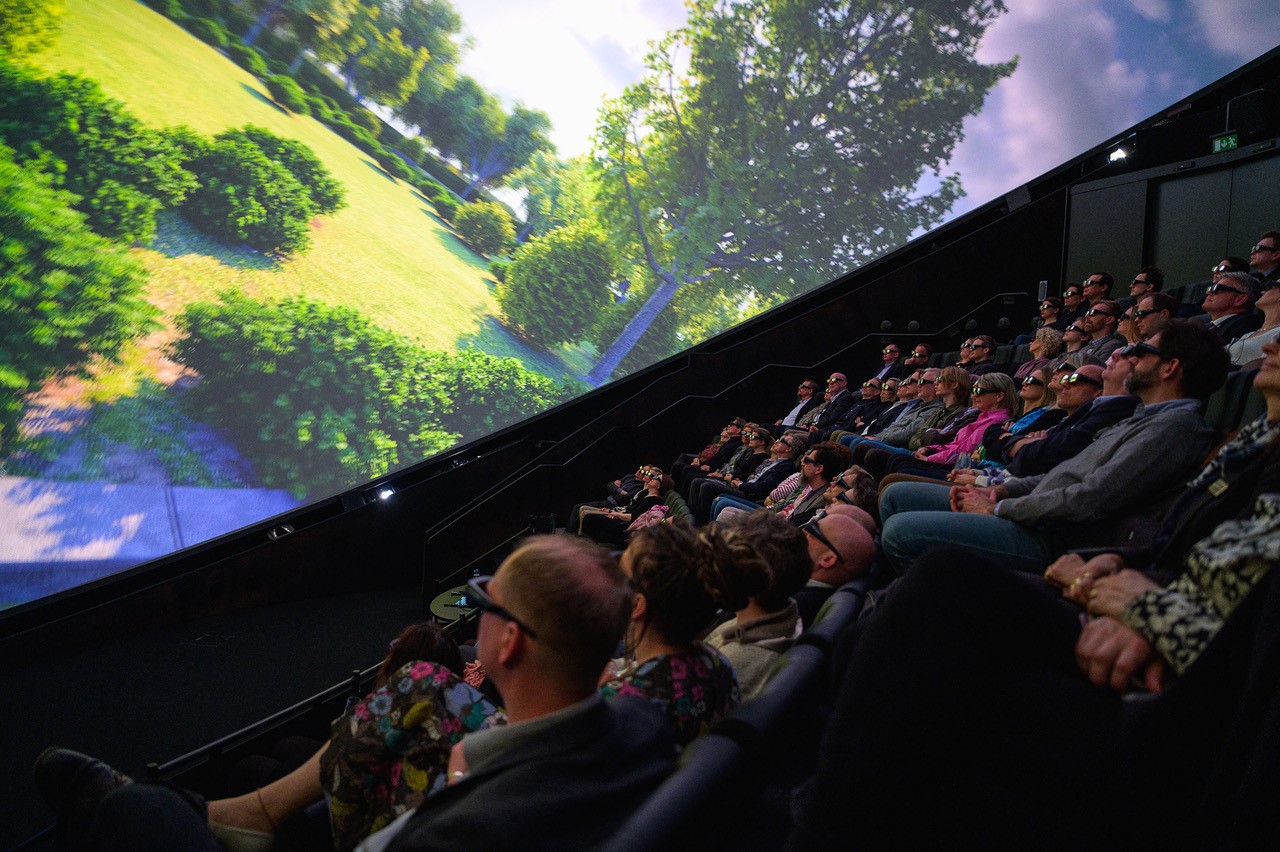 A theater filled with people watching the Chemistry of Life movie